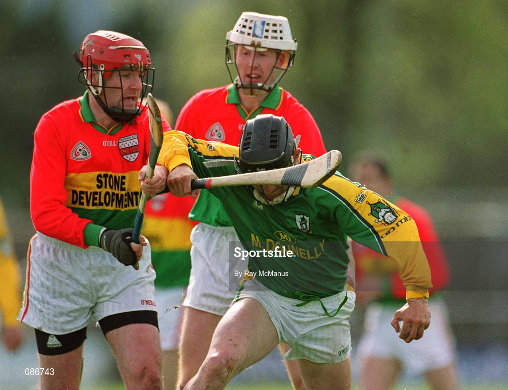 28 April 2002; Ray Dorran of Meath in action against Pat Coady of Carlow during the Guinness Leinster Senior Hurling Championship First Round match between Carlow and Meath at Dr Cullen Park in Carlow. Photo by Ray McManus/Sportsfile
