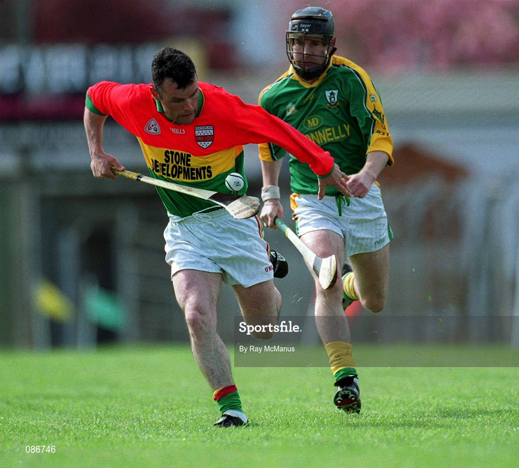 28 April 2002; Johnny Nevin of Carlow is tackled by Thomas Reilly of Meath during the Guinness Leinster Senior Hurling Championship First Round match between Carlow and Meath at Dr Cullen Park in Carlow. Photo by Ray McManus/Sportsfile
