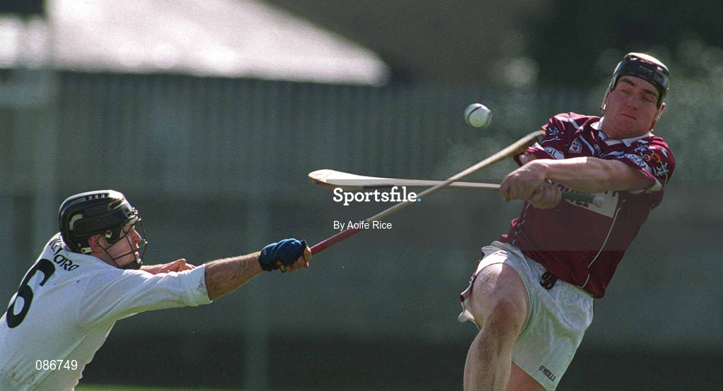28 April 2002; Andrew Mitchell of Westmeath is tackled by Kildare's Eamonn Denieffe of Kildare during the Guinness Leinster Senior Hurling Championship First Round match between Westmeath and Kildare at Cusack Park in Mullingar, Westmeath. Photo by Aoife Rice/Sportsfile