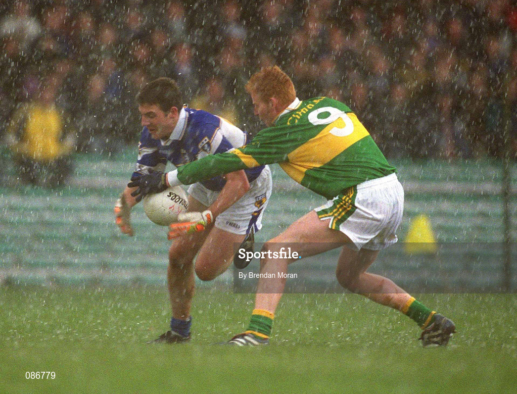 28 April 2002; Ian Fitzgerald of Laois in action against Seamus Scanlon of Kerry during the Allianz National Football League Division 2 Final match between Kerry and Laois at the Gaelic Grounds in Limerick. Photo by Brendan Moran/Sportsfile