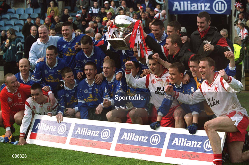 28 April 2002; The Tyrone players celebrate with the cup after the Allianz National Football League Division 1 Final match between Tyrone and Cavan at St Tiernach's Park in Clones, Monaghan. Photo by Pat Murphy/Sportsfile