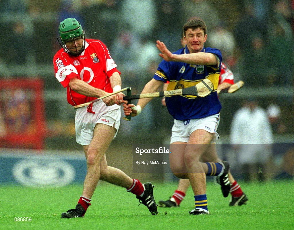 21 April 2002; Jerry O'Connor of Cork is blocked down by Noel Morris of Tipperary during the Allianz National Hurling League Semi-Final match between Cork and Tipperary at Páirc Uí Chaoimh in Cork. Photo by Ray McManus/Sportsfile