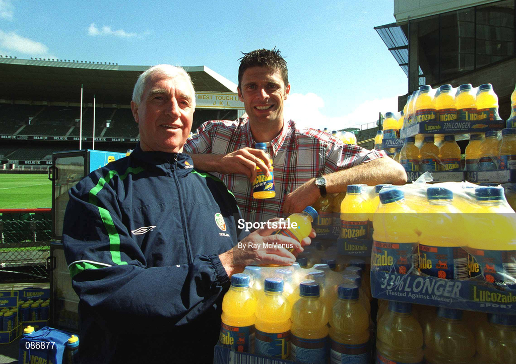 30 April 2002; Republic of Ireland International Niall Quinn with team physio Mick Byrne at Lansdowne Road when a consignment of Lucozade Sport stocks was dispatched to Japan and Korea in time for the 2002 FIFA World Cup. Photo by Ray McManus/Sportsfile