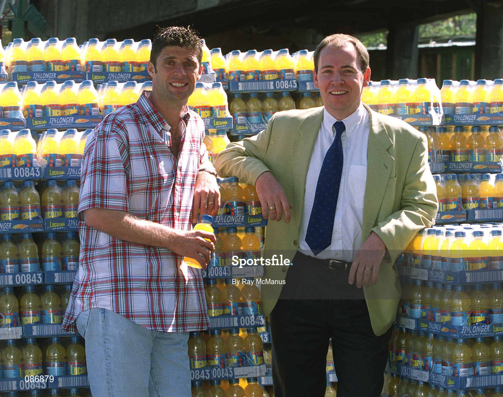 30 April 2002; Republic of Ireland International Niall Quinn, left, and Dr Giles Warrington, Head of Player Athlete Support, National Coaching and Training Centre (NCTC) in Limerick, at Lansdowne Road when a consignment of Lucozade Sport stocks was dispatched to Japan and Korea in time for the 2002 FIFA World Cup. Photo by Ray McManus/Sportsfile