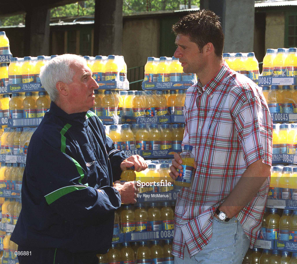 30 April 2002; Republic of Ireland International Niall Quinn with team physio Mick Byrne at Lansdowne Road when a consignment of Lucozade Sport stocks was dispatched to Japan and Korea in time for the 2002 FIFA World Cup. Photo by Ray McManus/Sportsfile