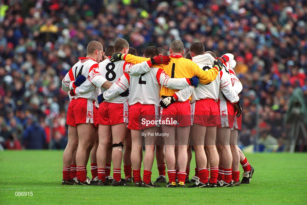 28 April 2002; Tyrone players in a huddle prior to the Allianz National Football League Division 1 Final match between Tyrone and Cavan at St Tiernach's Park in Clones, Monaghan. Photo by Pat Murphy/Sportsfile