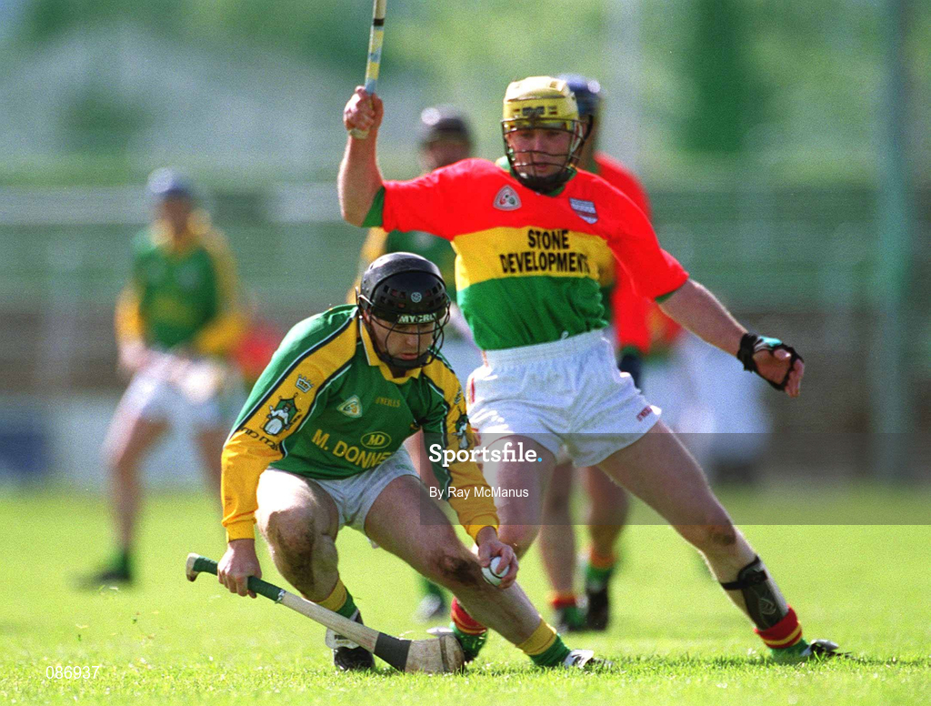 28 April 2002; Declan Murray of Meath in action against Damien Roberts of Carlow during the Guinness Leinster Senior Hurling Championship First Round match between Carlow and Meath at Dr Cullen Park in Carlow. Photo by Ray McManus/Sportsfile