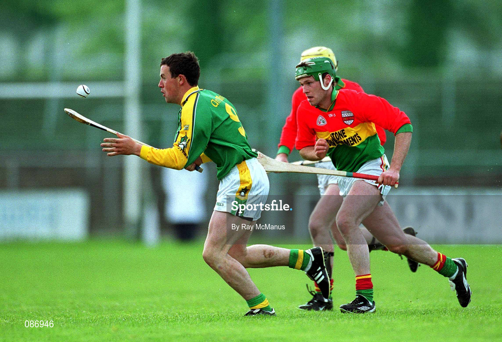 28 April 2002; David Callaghan of Meath in action against Paddy Coady of Carlow during the Guinness Leinster Senior Hurling Championship First Round match between Carlow and Meath at Dr Cullen Park in Carlow. Photo by Ray McManus/Sportsfile
