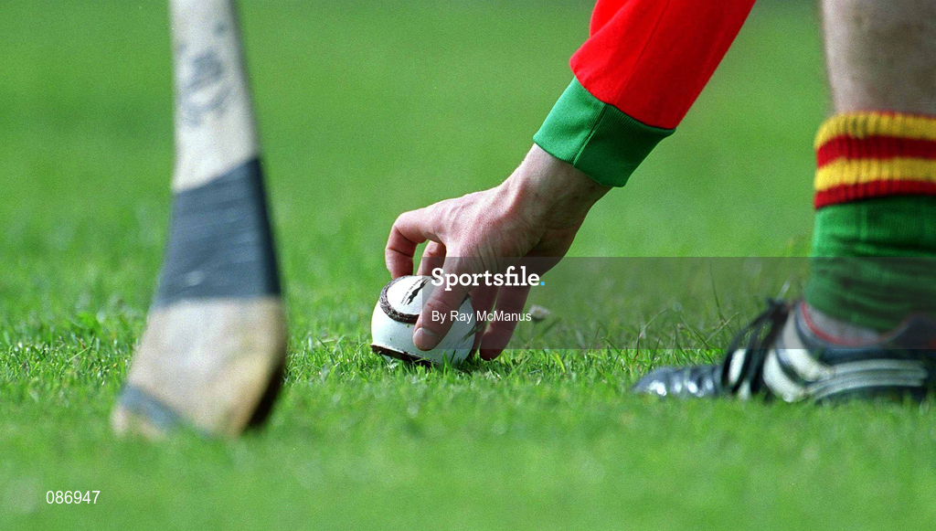 28 April 2002; A Carlow player places the sliotar for a free during the Guinness Leinster Senior Hurling Championship First Round match between Carlow and Meath at Dr Cullen Park in Carlow. Photo by Ray McManus/Sportsfile