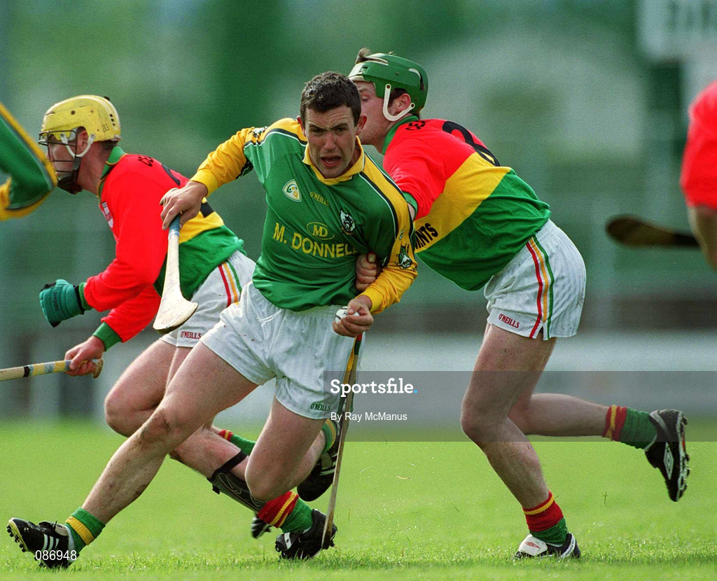 28 April 2002; David Callaghan of Meath in action against Paddy Coady of Carlow during the Guinness Leinster Senior Hurling Championship First Round match between Carlow and Meath at Dr Cullen Park in Carlow. Photo by Ray McManus/Sportsfile