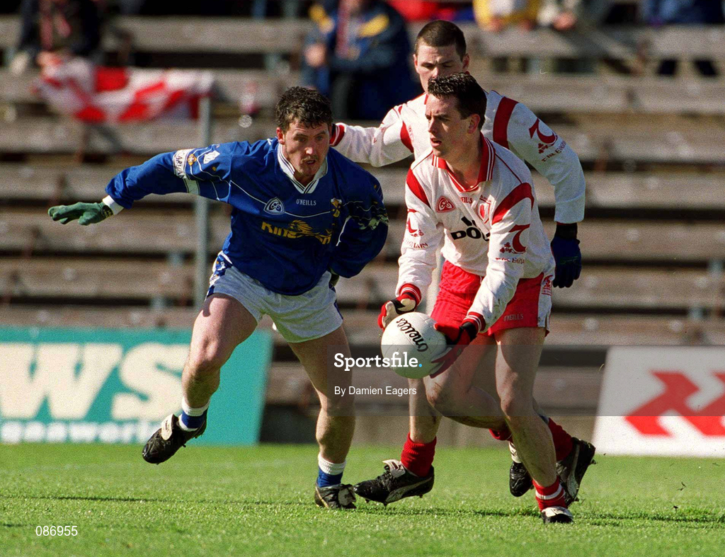 28 April 2002; Brian Robinson of Tyrone in action against Eddie Reilly of Cavan during the Allianz National Football League Division 1 Final match between Tyrone and Cavan at St Tiernach's Park in Clones, Monaghan. Photo by Damien Eagers/Sportsfile