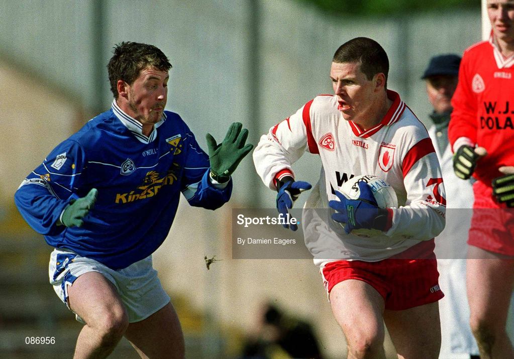 28 April 2002; Conor Gormley of Tyrone in action against Eddie Reilly of Cavan during the Allianz National Football League Division 1 Final match between Tyrone and Cavan at St Tiernach's Park in Clones, Monaghan. Photo by Damien Eagers/Sportsfile