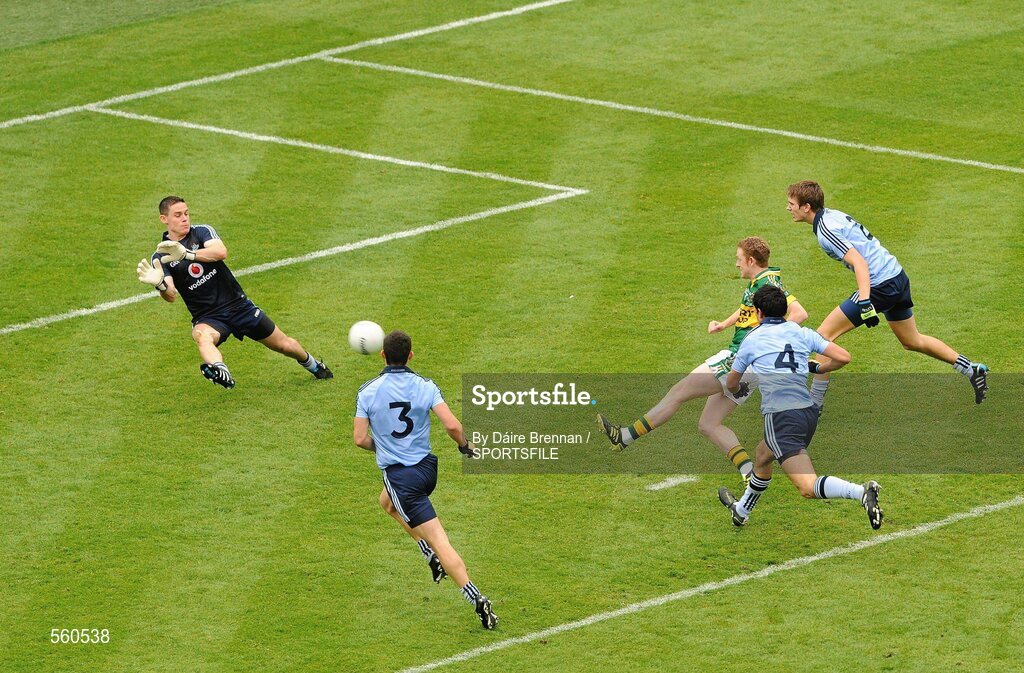 18 September 2011; Colm Cooper, Kerry, scores his side's first goal despite the efforts of Dublin goalkeeper Stephen Cluxton, and full back line, left to right, Rory O'Carroll, Cian O'Sullivan, and Michael Fitzsimons. GAA Football All-Ireland Senior Championship Final, Kerry v Dublin, Croke Park, Dublin. Picture credit: Dáire Brennan / SPORTSFILE