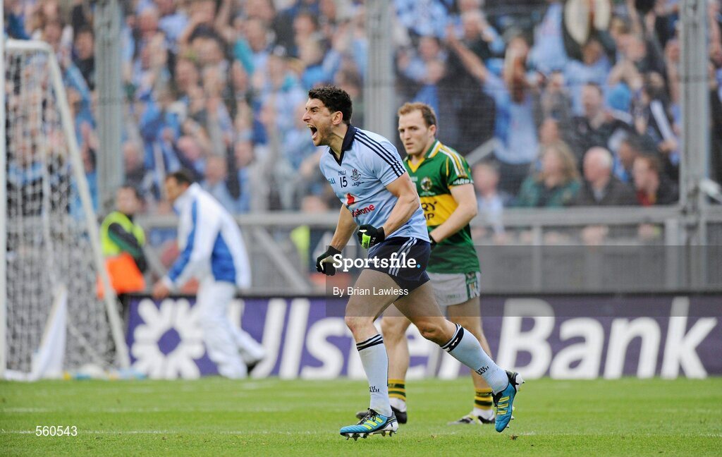 18 September 2011; Dublin's Bernard Brogan celebrates after scoring a late point as Kerry's Darran O'Sullivan looks on. GAA Football All-Ireland Senior Championship Final, Kerry v Dublin, Croke Park, Dublin. Picture credit: Brian Lawless / SPORTSFILE