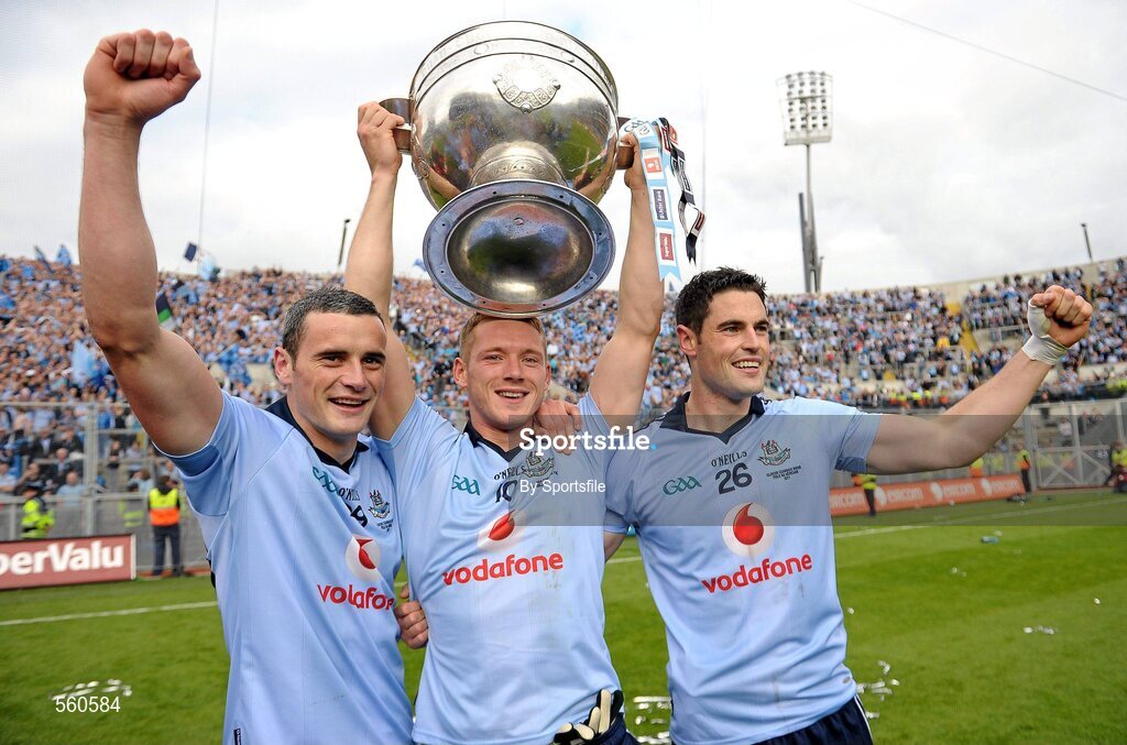 18 September 2011; Dublin players Paul Brogan, left, Paul Flynn, and Ross MCConnell, right, celebrate with the Sam Maguire cup after the game. GAA Football All-Ireland Senior Championship Final, Kerry v Dublin, Croke Park, Dublin. Photo by Sportsfile