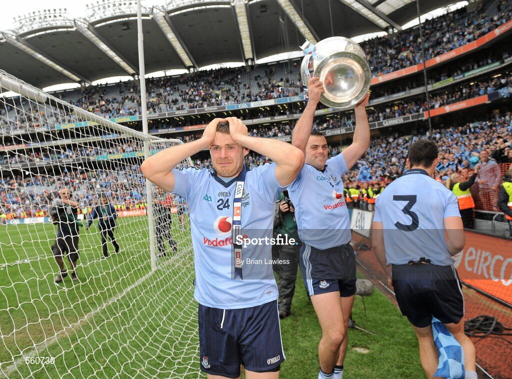 18 September 2011; Dublin's Paul Casey celebrates with the Sam Maguire cup as team-mate Kevin McManamon is overcome with emotion. GAA Football All-Ireland Senior Championship Final, Kerry v Dublin, Croke Park, Dublin. Picture credit: Brian Lawless / SPORTSFILE