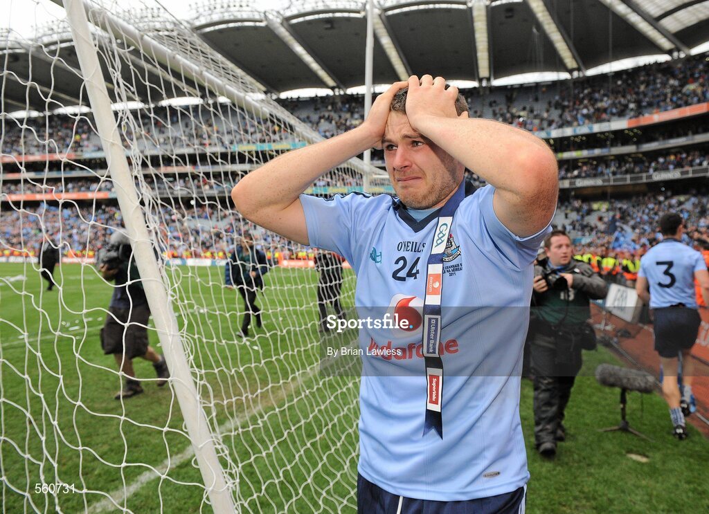 18 September 2011; Dublin's Kevin McManamon is overcome with emotion after the match. GAA Football All-Ireland Senior Championship Final, Kerry v Dublin, Croke Park, Dublin. Picture credit: Brian Lawless / SPORTSFILE