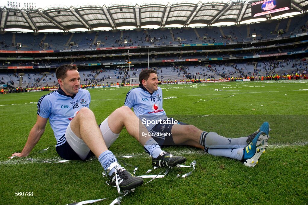 18 September 2011;  Dublin players, Declan Lally, left and Bernard Brogan sit on the pitch after the game. GAA Football All-Ireland Senior Championship Final, Kerry v Dublin, Croke Park, Dublin. Picture credit: David Maher / SPORTSFILE