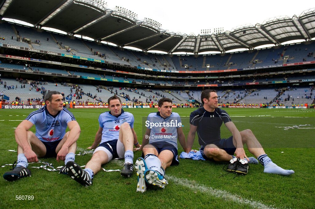 18 September 2011; Dublin players, from left to right, Paul Brogan, Declan Lally, Bernard Brogan and Denis Bastick sit on the pitch after the game. GAA Football All-Ireland Senior Championship Final, Kerry v Dublin, Croke Park, Dublin. Picture credit: David Maher / SPORTSFILE