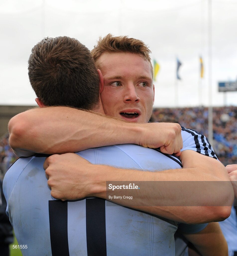 18 September 2011; Dublin's Paul Flynn hugs team-mate Barry Cahill after the game. GAA Football All-Ireland Senior Championship Final, Kerry v Dublin, Croke Park, Dublin. Picture credit: Barry Cregg / SPORTSFILE