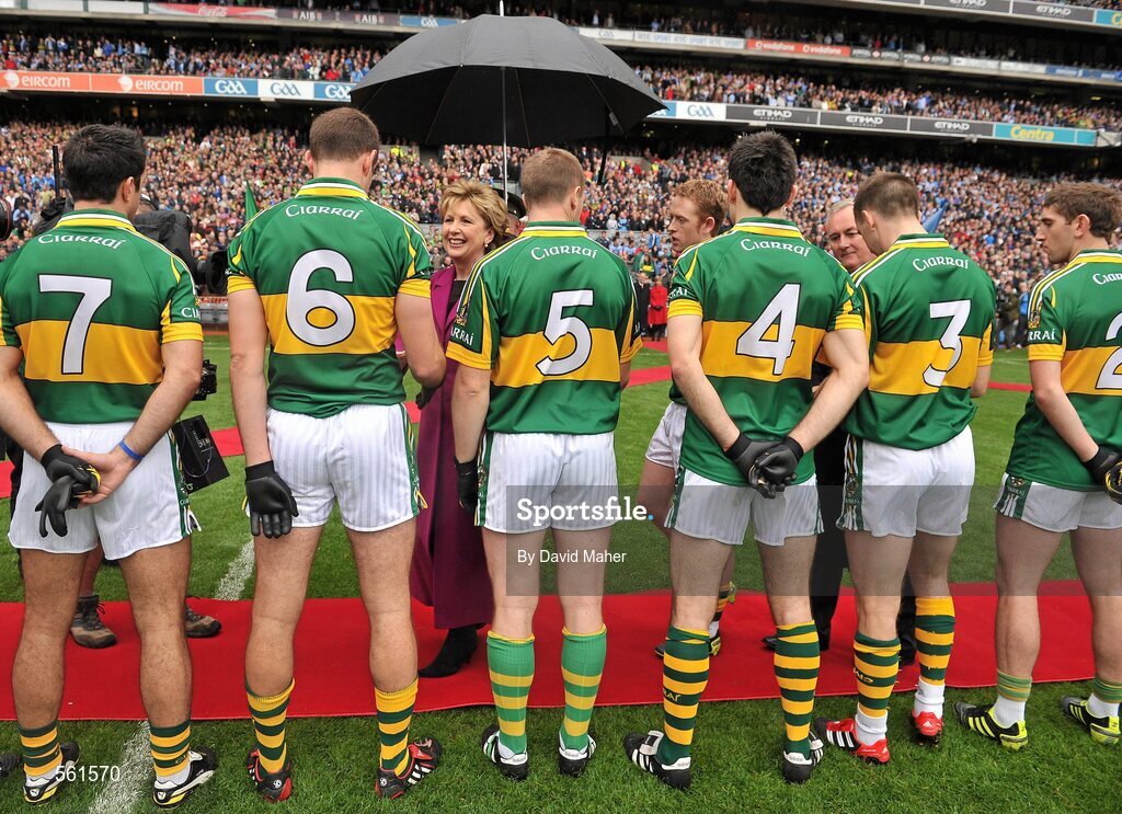 18 September 2011; The President of Ireland Mary McAleese, accompanied by Uachtarán CLG Criostóir Ó Cuana, is introduced to the Kerry team by captain Colm Cooper before the game. GAA Football All-Ireland Senior Championship Final, Kerry v Dublin, Croke Park, Dublin. Picture credit: David Maher / SPORTSFILE