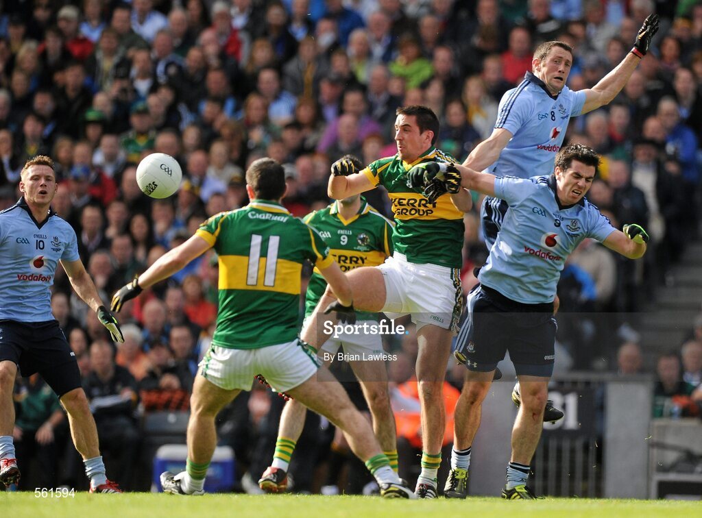 18 September 2011; Anthony Maher, Kerry, in action against Denis Bastick and Michael Darragh Macauley, right, Dublin. GAA Football All-Ireland Senior Championship Final, Kerry v Dublin, Croke Park, Dublin. Picture credit: Brian Lawless / SPORTSFILE