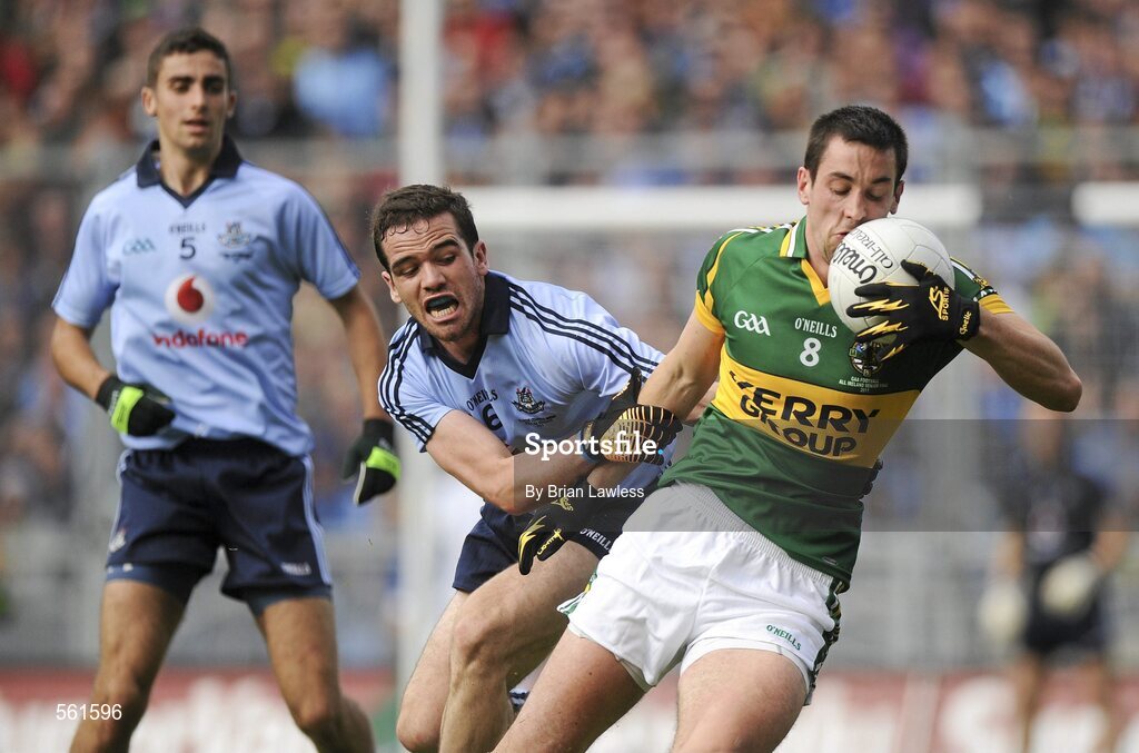 18 September 2011; Anthony Maher, Kerry, in action against Ger Brennan, Dublin. GAA Football All-Ireland Senior Championship Final, Kerry v Dublin, Croke Park, Dublin. Picture credit: Brian Lawless / SPORTSFILE