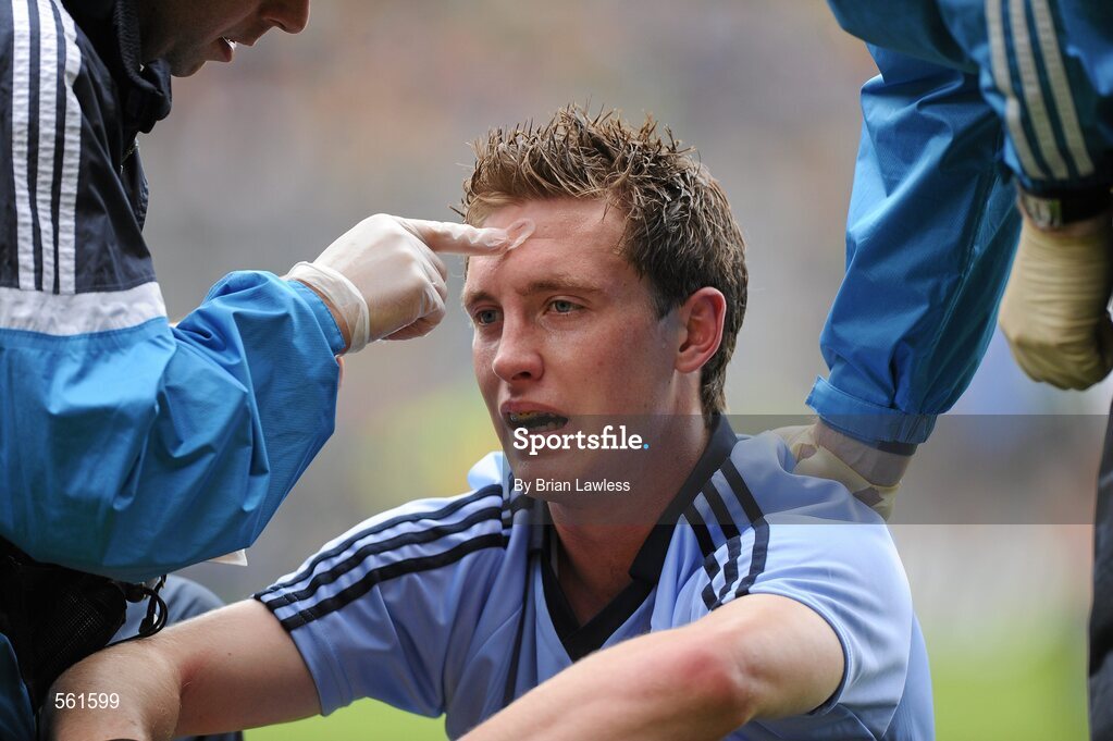 18 September 2011; Kevin Nolan, Dublin, receives attention after a challenge. GAA Football All-Ireland Senior Championship Final, Kerry v Dublin, Croke Park, Dublin. Picture credit: Brian Lawless / SPORTSFILE