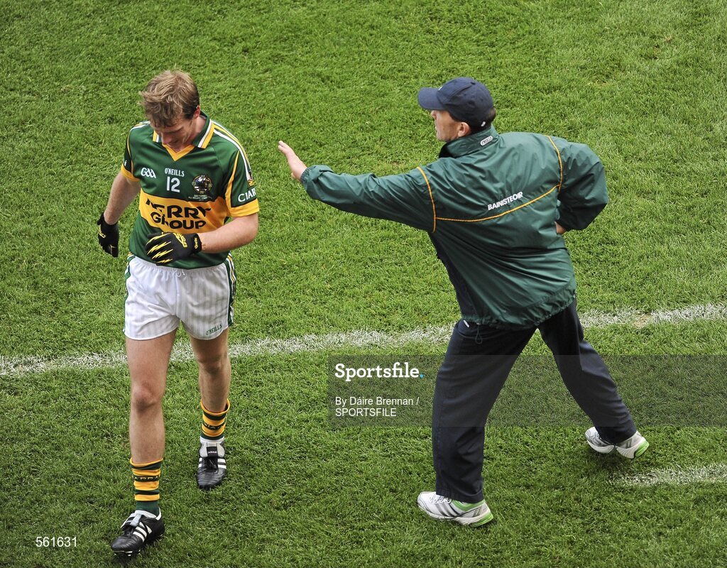 18 September 2011; Kerry manager Jack O'Connor consoles Donnchadh Walsh after he was substituted. GAA Football All-Ireland Senior Championship Final, Kerry v Dublin, Croke Park, Dublin. Picture credit: Dáire Brennan / SPORTSFILE