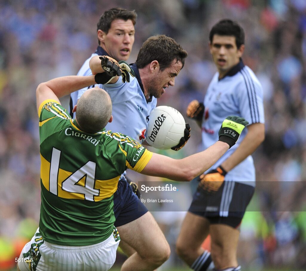18 September 2011; Ger Brennan, Dublin, pushes Kerry's Kieran Donaghy out of his way to take a free. GAA Football All-Ireland Senior Championship Final, Kerry v Dublin, Croke Park, Dublin. Picture credit: Brian Lawless / SPORTSFILE