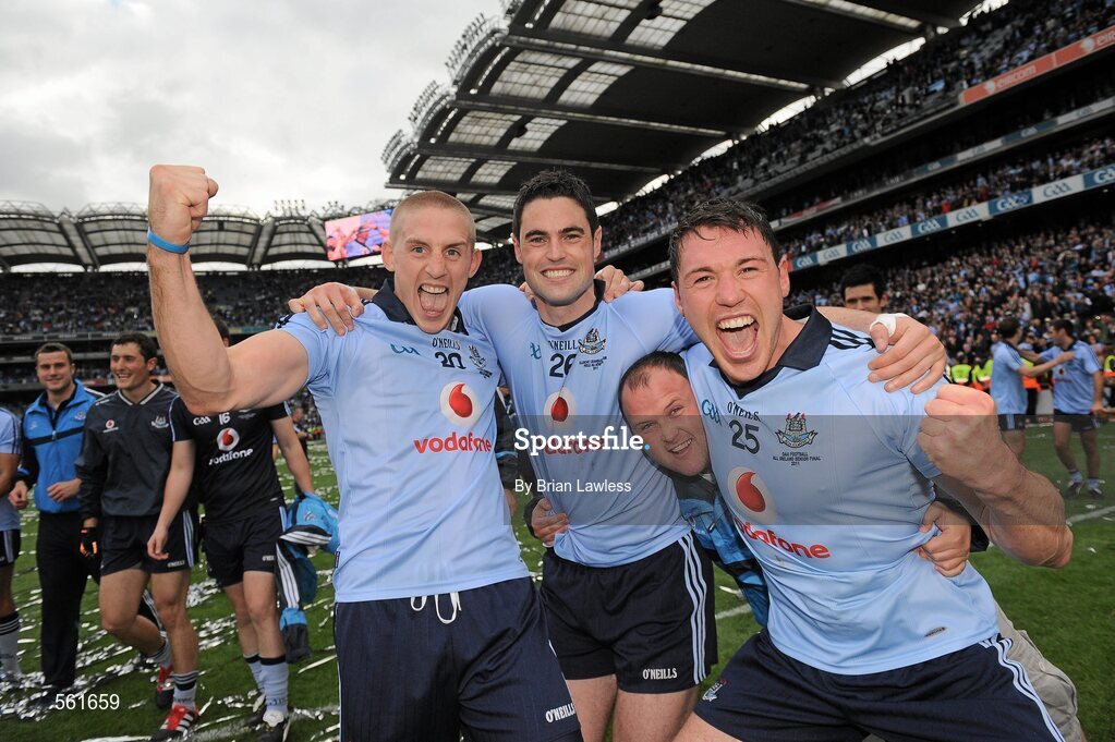 18 September 2011; Dublin players, from left, Eoghan O'Gara, Ross McConnell, and Éamon Fennell with supporter Stephen Molloy, celebrate after the match. GAA Football All-Ireland Senior Championship Final, Kerry v Dublin, Croke Park, Dublin. Picture credit: Brian Lawless / SPORTSFILE