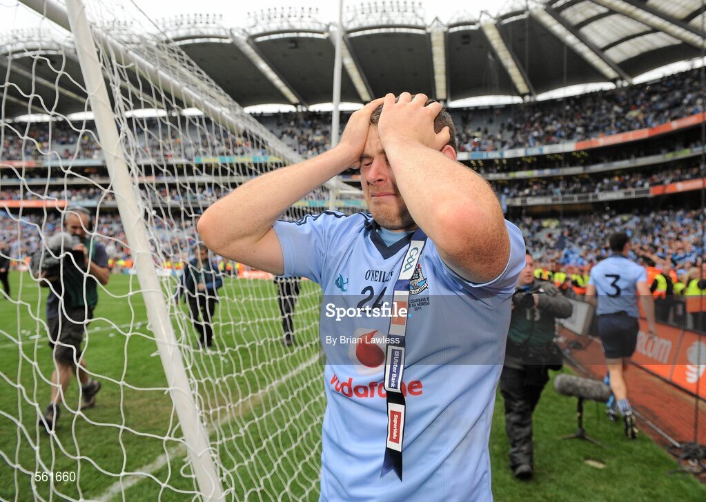 18 September 2011; Dublin's Kevin McManamon is overcome with emotion after the match. GAA Football All-Ireland Senior Championship Final, Kerry v Dublin, Croke Park, Dublin. Picture credit: Brian Lawless / SPORTSFILE