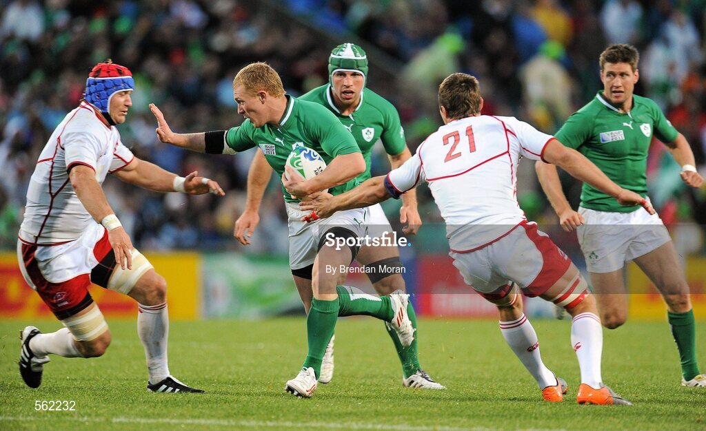 25 September 2011; Keith Earls, Ireland, breaks through the Russian defence of Artem Fatakhov, left, and Mikhail Sidorov on the way to scoring his second, and his side's sixth, try. 2011 Rugby World Cup, Pool C, Ireland v Russia, Rotorua International Stadium, Rotorua, New Zealand. Picture credit: Brendan Moran / SPORTSFILE