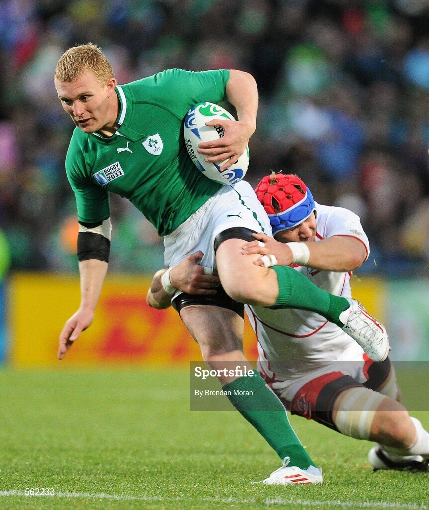 25 September 2011; Keith Earls, Ireland, breaks through the tackle of Artem Fatakhov, Russia, on the way to scoring his second, and his side's sixth, try. 2011 Rugby World Cup, Pool C, Ireland v Russia, Rotorua International Stadium, Rotorua, New Zealand. Picture credit: Brendan Moran / SPORTSFILE