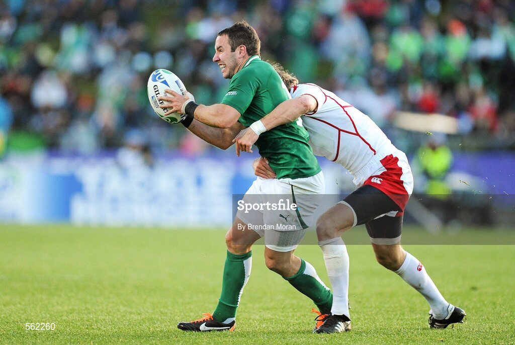 25 September 2011; Paddy Wallace, Ireland, is tackled by Andrey Kuzin, Russia. 2011 Rugby World Cup, Pool C, Ireland v Russia, Rotorua International Stadium, Rotorua, New Zealand. Picture credit: Brendan Moran / SPORTSFILE