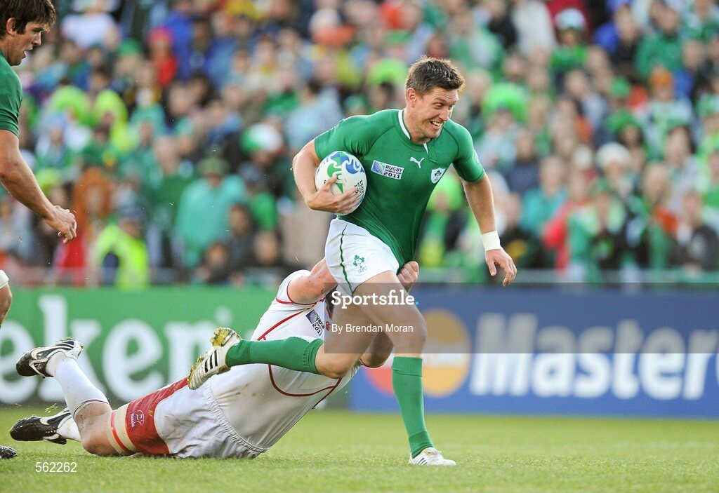 25 September 2011; Ronan O'Gara, Ireland, is tackled by Andrey Garbuzov, Russia. 2011 Rugby World Cup, Pool C, Ireland v Russia, Rotorua International Stadium, Rotorua, New Zealand. Picture credit: Brendan Moran / SPORTSFILE