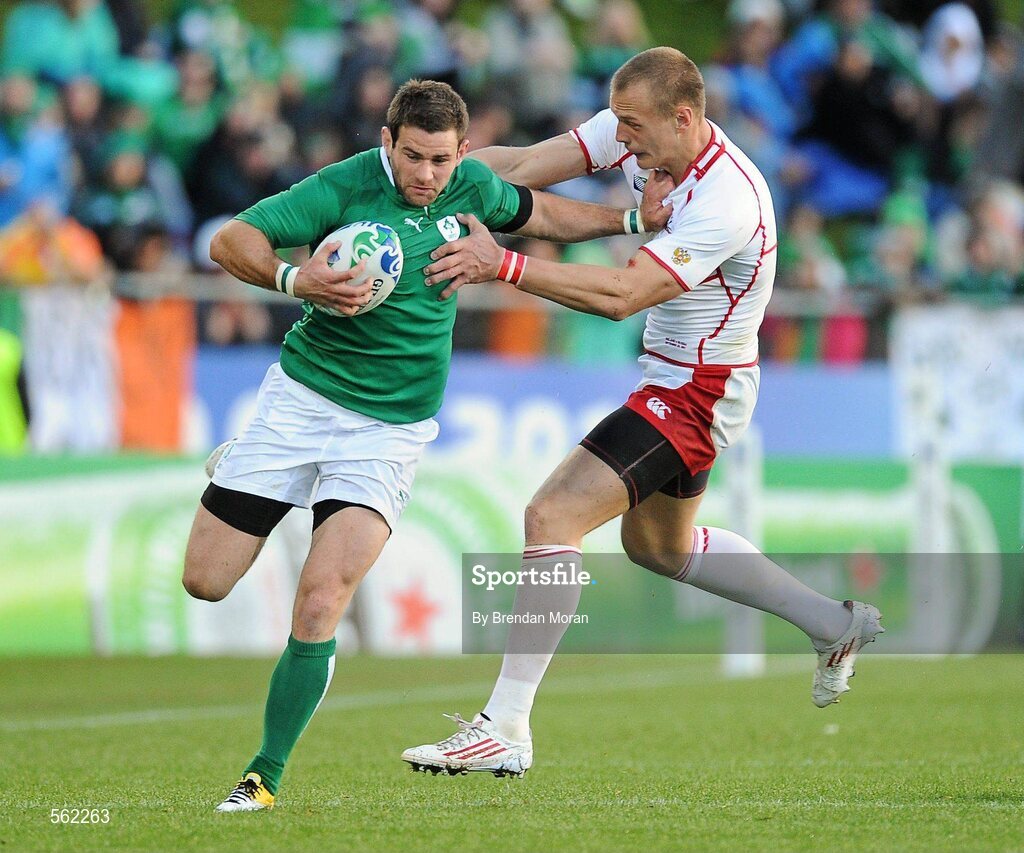 25 September 2011; Fergus McFadden, Ireland, is tackled by Denis Simplikevich, Russia. 2011 Rugby World Cup, Pool C, Ireland v Russia, Rotorua International Stadium, Rotorua, New Zealand. Picture credit: Brendan Moran / SPORTSFILE