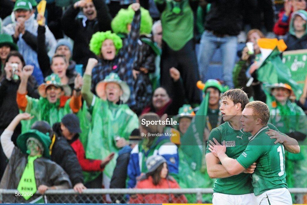 25 September 2011; Irish supporters celebrate as Andrew Trimble congratulates Keith Earls on scoring his first, and Ireland's fourth, try of the game. 2011 Rugby World Cup, Pool C, Ireland v Russia, Rotorua International Stadium, Rotorua, New Zealand. Picture credit: Brendan Moran / SPORTSFILE