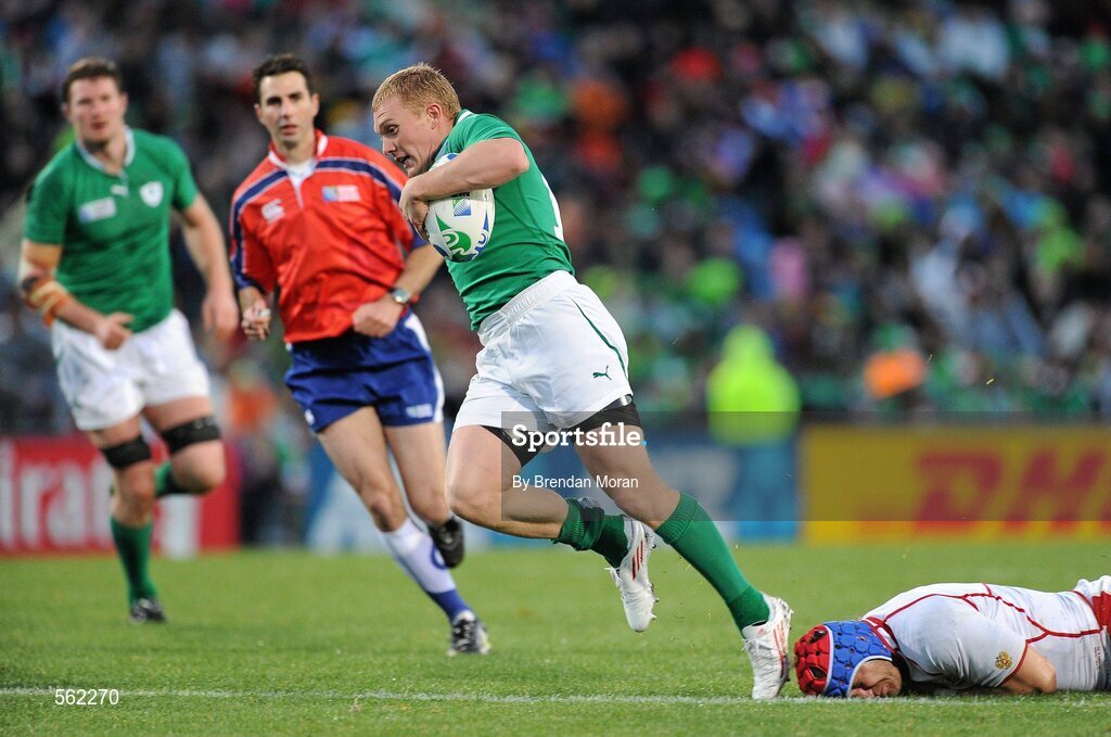 25 September 2011; Keith Earls, Ireland, slips through the tackle of Artem Fatakhov, Russia, on the way to scoring his second and his side's 6th try. 2011 Rugby World Cup, Pool C, Ireland v Russia, Rotorua International Stadium, Rotorua, New Zealand. Picture credit: Brendan Moran / SPORTSFILE