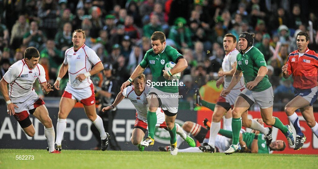 25 September 2011; Fergus McFadden, Ireland, breaks clear of Alexander Yanyushkin, Russia. 2011 Rugby World Cup, Pool C, Ireland v Russia, Rotorua International Stadium, Rotorua, New Zealand. Picture credit: Brendan Moran / SPORTSFILE