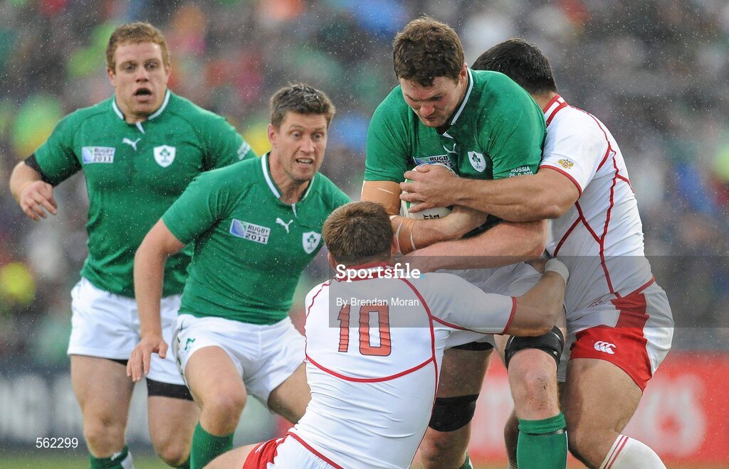 25 September 2011; Donnacha Ryan, Ireland, supported by Ronan O'Gara and Sean Cronin, is tackled by Konstantin Rachkov, Russia. 2011 Rugby World Cup, Pool C, Ireland v Russia, Rotorua International Stadium, Rotorua, New Zealand. Picture credit: Brendan Moran / SPORTSFILE