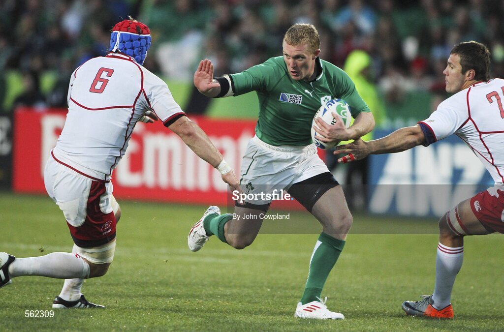 25 September 2011; Keith Earls, Ireland, breaks through the Russia defence of Artem Fatakhov, left, and Mikhail Sidorov on the way to scoring his second, and his side's sixth, try. 2011 Rugby World Cup, Pool C, Ireland v Russia, Rotorua International Stadium, Rotorua, New Zealand. Picture credit: John Cowpland / SPORTSFILE