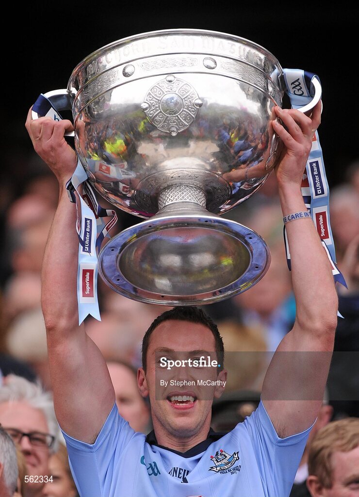 18 September 2011; Barry Cahill, Dublin, lifts The Sam Maguire Cup. GAA Football All-Ireland Senior Championship Final, Kerry v Dublin, Croke Park, Dublin. Picture credit: Stephen McCarthy / SPORTSFILE