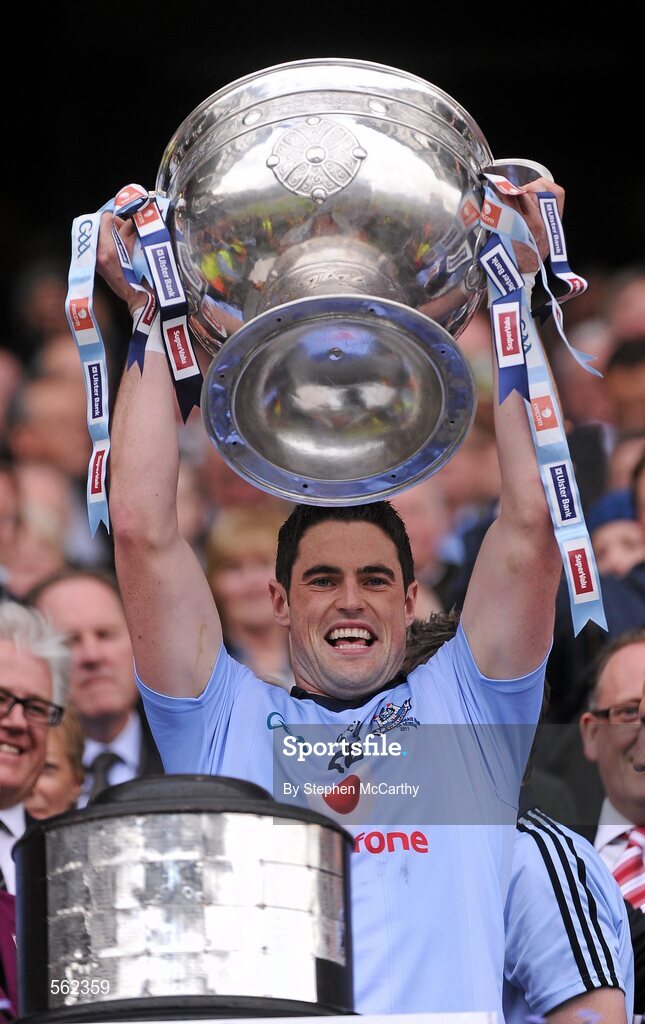 18 September 2011; Ross McConnell, Dublin, lifts The Sam Maguire Cup. GAA Football All-Ireland Senior Championship Final, Kerry v Dublin, Croke Park, Dublin. Picture credit: Stephen McCarthy / SPORTSFILE