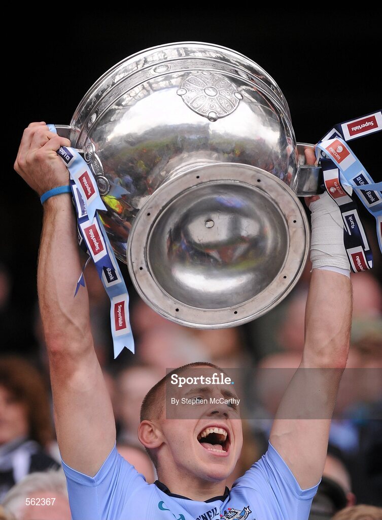 18 September 2011; Eoghan O'Gara, Dublin, lifts The Sam Maguire Cup. GAA Football All-Ireland Senior Championship Final, Kerry v Dublin, Croke Park, Dublin. Picture credit: Stephen McCarthy / SPORTSFILE