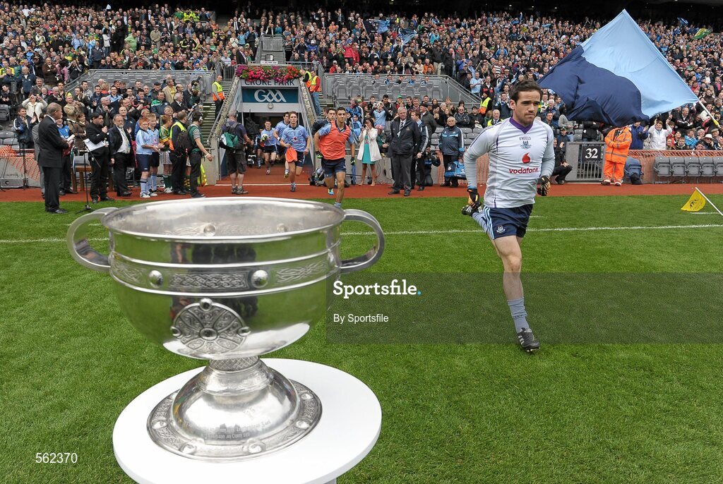 18 September 2011; Ger Brennan, Dublin, runs out on to the pitch past the Sam Maguire cup. GAA Football All-Ireland Senior Championship Final, Kerry v Dublin, Croke Park, Dublin. Photo by Sportsfile