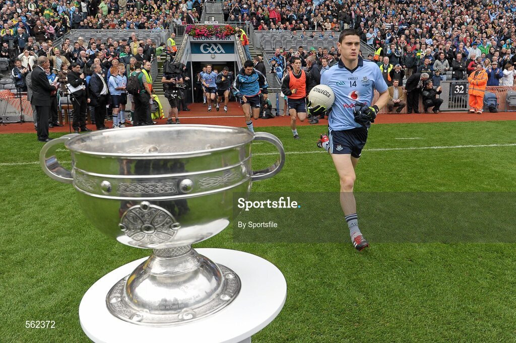 18 September 2011; Diarmuid Connolly, Dublin, runs out on to the pitch past the Sam Maguire cup. GAA Football All-Ireland Senior Championship Final, Kerry v Dublin, Croke Park, Dublin. Photo by Sportsfile