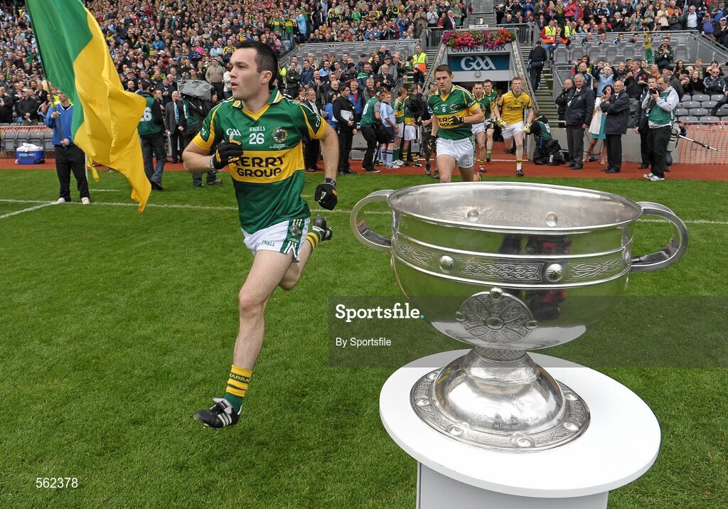 18 September 2011; Brian McGuire, Kerry, runs out on to the pitch past the Sam Maguire cup. GAA Football All-Ireland Senior Championship Final, Kerry v Dublin, Croke Park, Dublin. Photo by Sportsfile