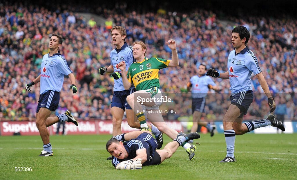 18 September 2011; Colm Cooper, Kerry, reacts after scoring his side's goal, despite the attention of Dublin players James McCarthy, left, Michael Fitzsimons, goalkeeper Stephen Cluxton and Cian O'Sullivan. GAA Football All-Ireland Senior Championship Final, Kerry v Dublin, Croke Park, Dublin. Picture credit: Stephen McCarthy / SPORTSFILE