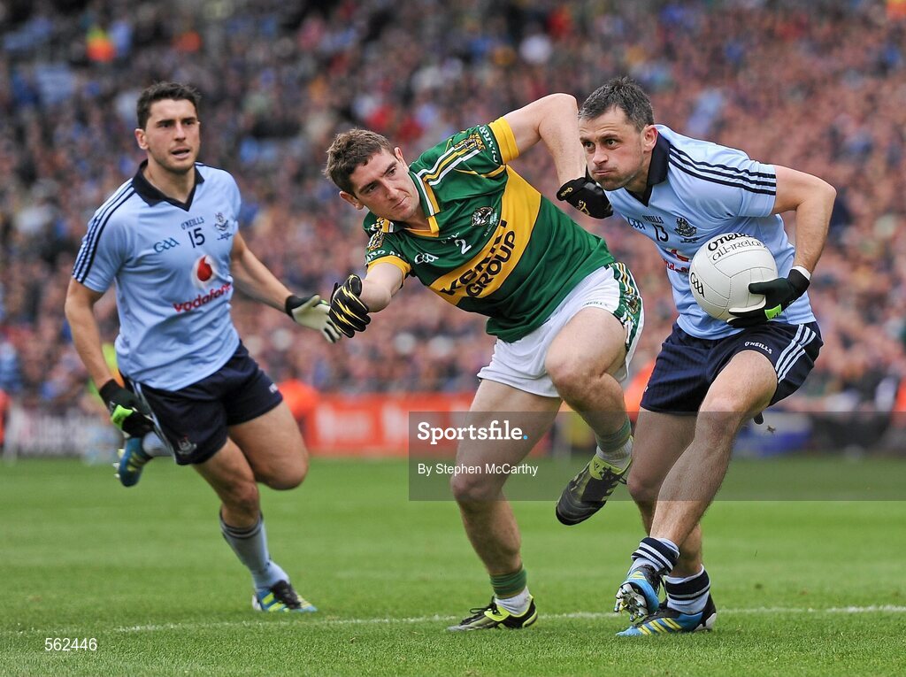 18 September 2011; Alan Brogan, Dublin, with support from Bernard Brogan, is tackled by Killian Young, Kerry. GAA Football All-Ireland Senior Championship Final, Kerry v Dublin, Croke Park, Dublin. Picture credit: Stephen McCarthy / SPORTSFILE